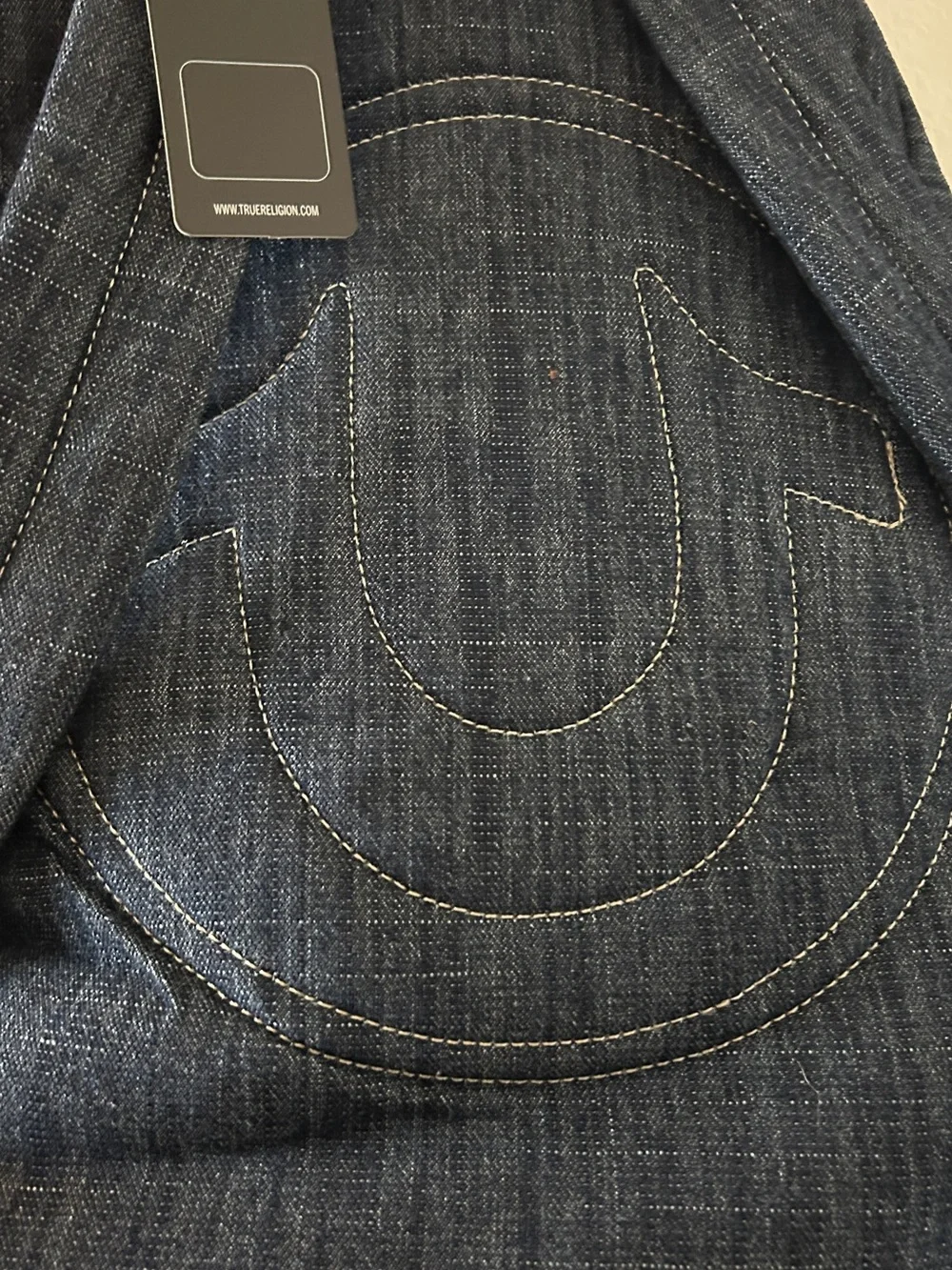True Religion Dark Denim Backpack with Red Accents